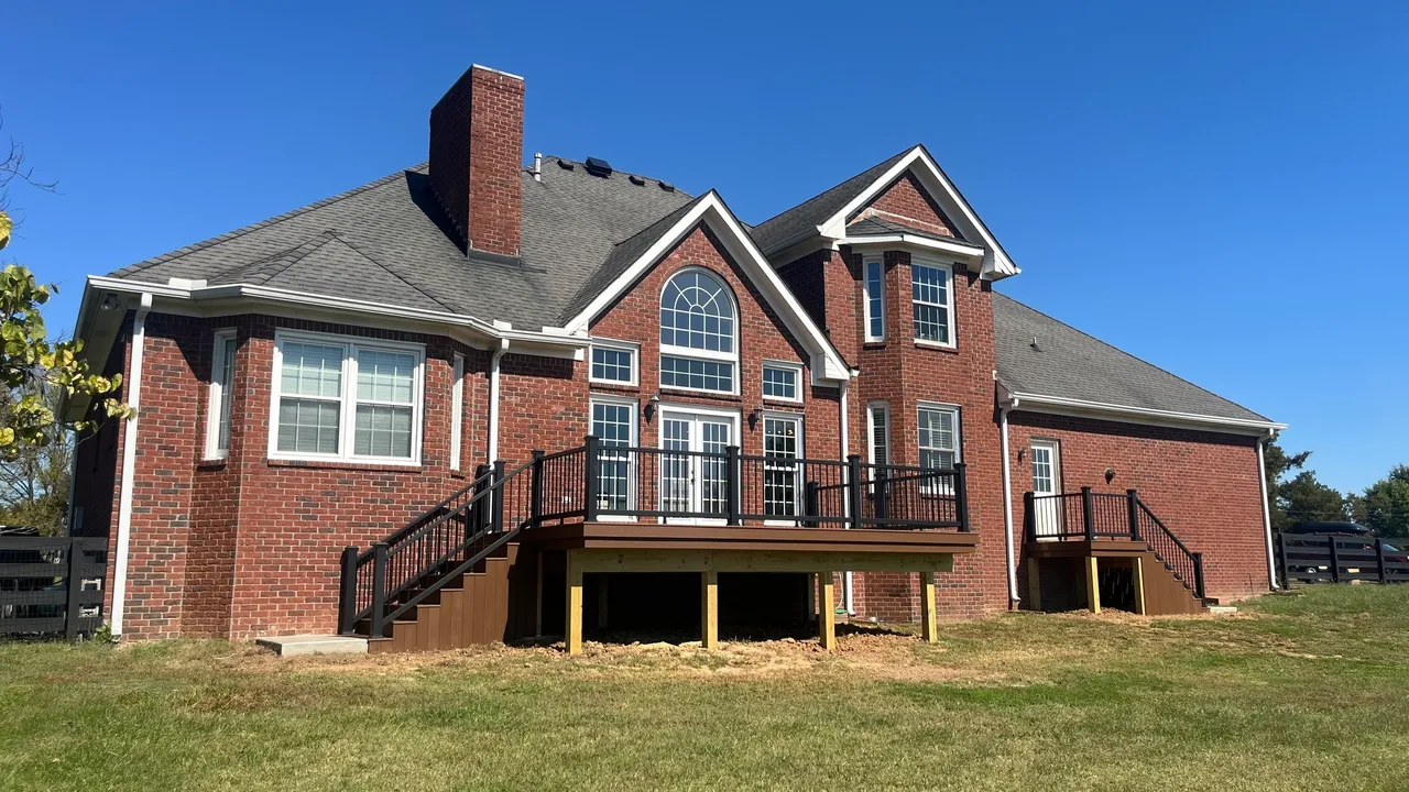Beautiful brick house with a deck on a sunny day